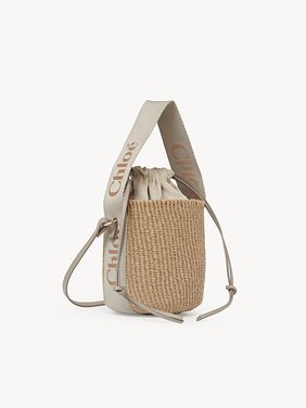 Bolso cesta pequeño Woody de fibras naturales Papel de comercio justo, cuero de becerro y cincha de poliéster con logotipo Chloé bordado
Vintage Khaki