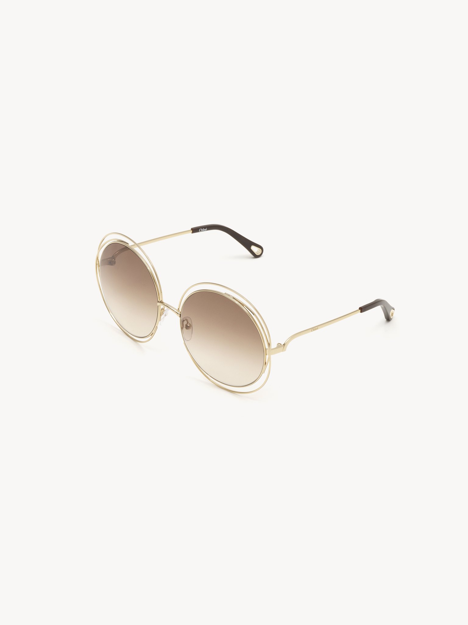 Carlina sunglasses Gold metal
Gradient brown lenses