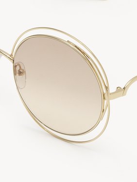 Carlina Petite sunglasses Gold metal
Gradient beige lenses Product detail