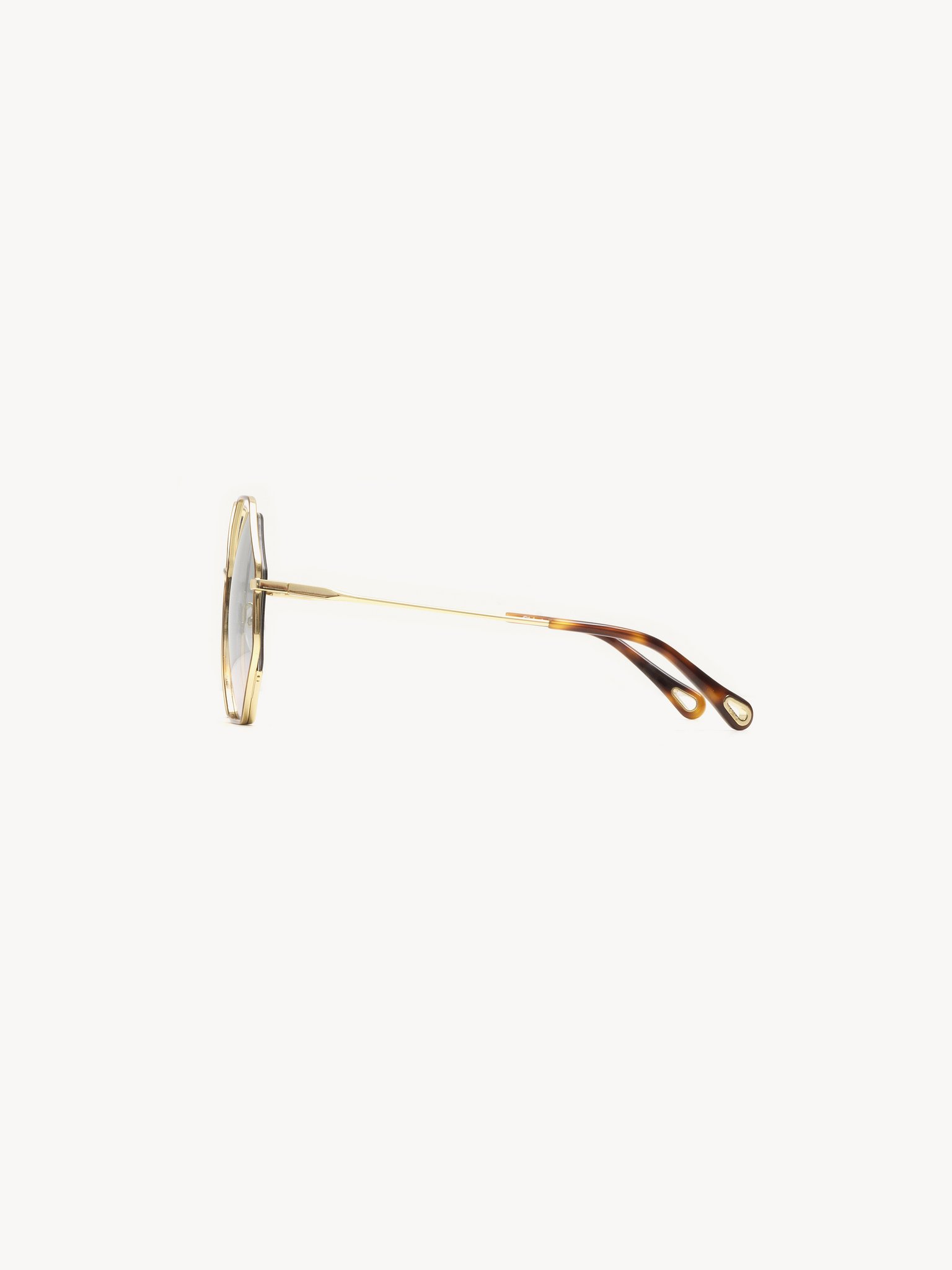 Poppy sunglasses Gold metal & havana
Gradient green to pink lenses Back view of the product