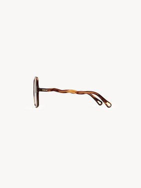 Zelie sunglasses Medium havana
Solid brown lenses Back view of the product