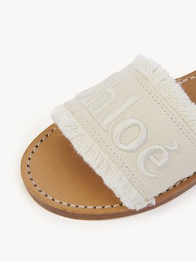 Fringed sandals Cowhide & cotton
Ivory Product detail