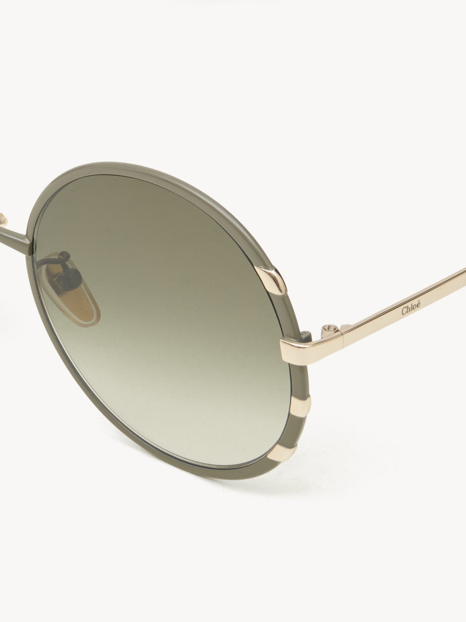 Celeste sunglasses Khaki & gold metal
Gradient green lenses Product detail