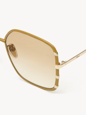 Celeste sunglasses Ochre & gold metal
Gradient light brown lenses Product detail