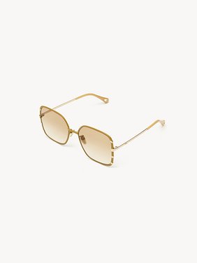 Celeste sunglasses Ochre & gold metal
Gradient light brown lenses