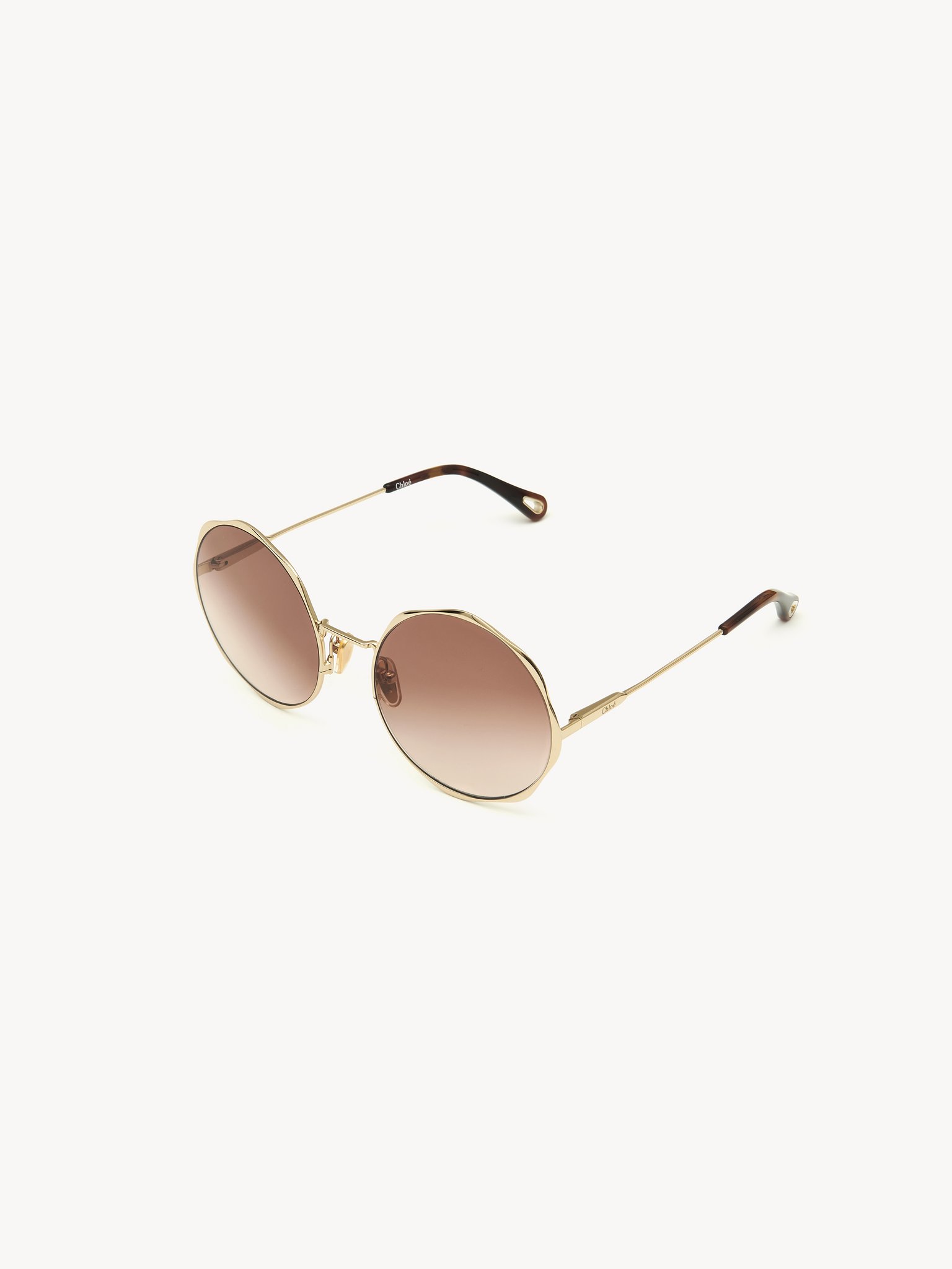 Honoré sunglasses Gold metal & bio-based nylon
Gradient Rust lenses