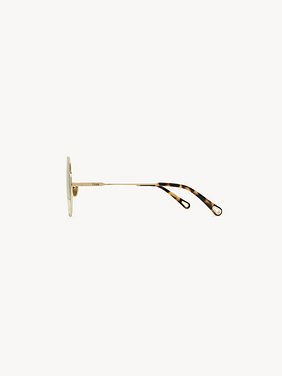 Honoré sunglasses Gold metal & bio-based nylon
Gradient Green lenses Product detail