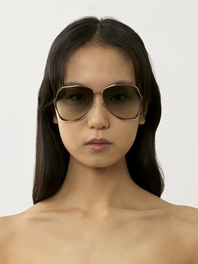 Honoré sunglasses Gold metal & bio-based nylon
Gradient Green lenses Back view of the product