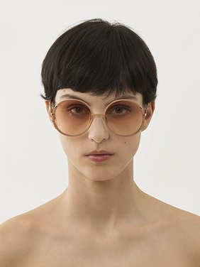 Celeste sunglasses Nude & gold metal
Gradient coral lenses Top view of the product