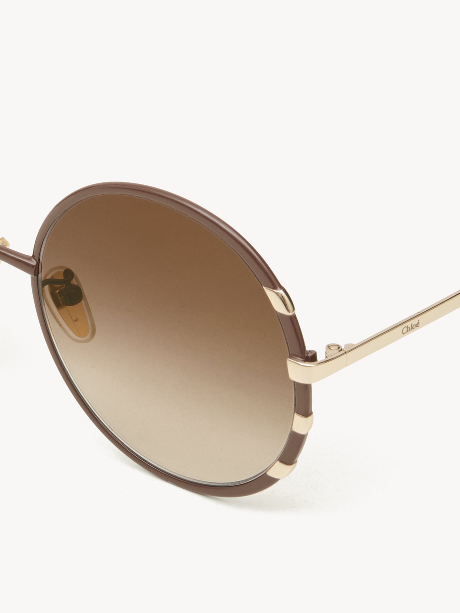 Celeste sunglasses Brown & gold metal
Gradient brown lenses Product detail