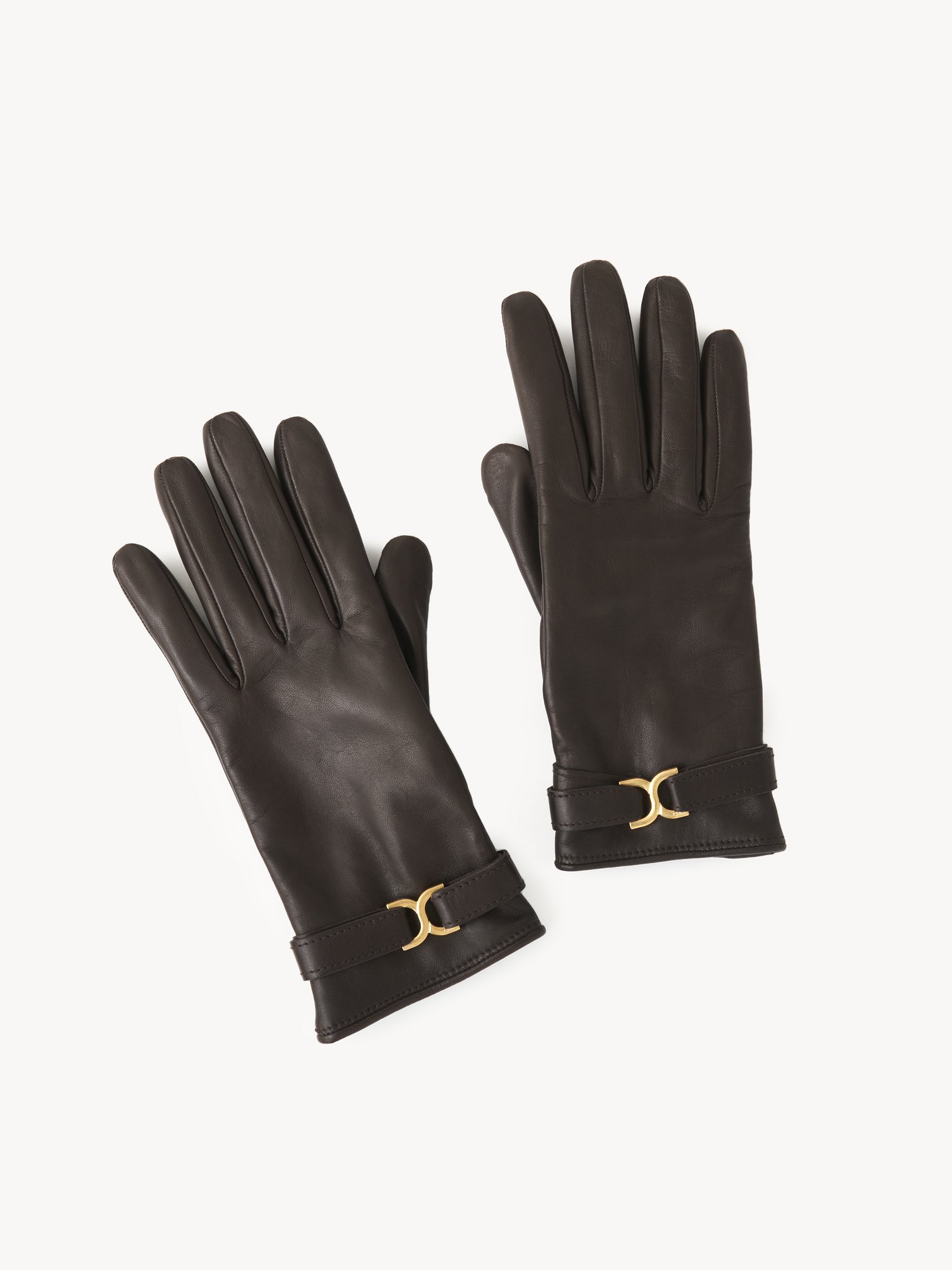 Marcie gloves in soft lambskin Soft lambskin & brass
Darkened Brown