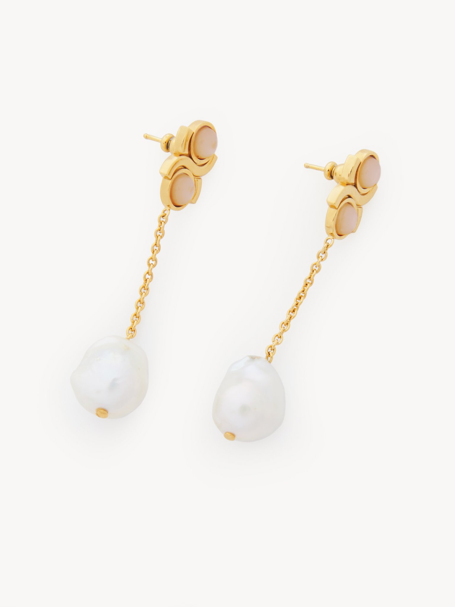 Marcie earrings Brass, cultured freshwater pearls & rose quartz
Bright Gold Back view of the product