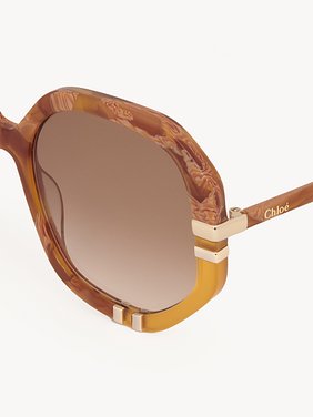 Lunettes de soleil West Petite Acétate biosourcé finition écaille et miel & métal
Verres marron dégradé Vue de dessus de l’article