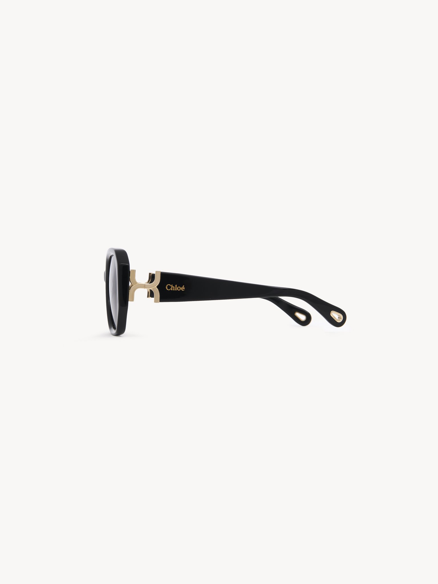 Marcie sunglasses Black lower-impact acetate & bio-based nylon 
Brown lenses Product detail