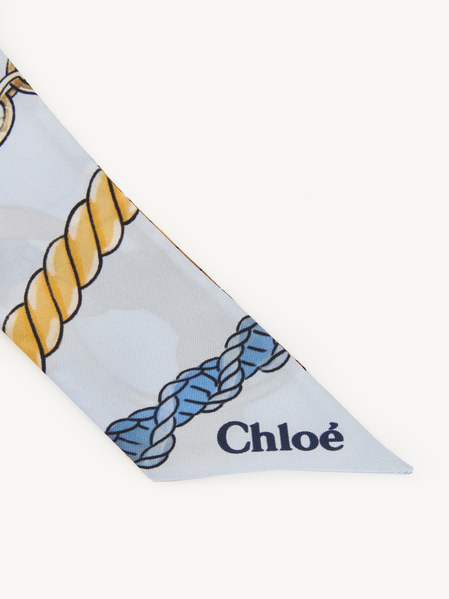 Bandeau scarf in silk Chloé signature print on organic silk
Silky Blue Product detail