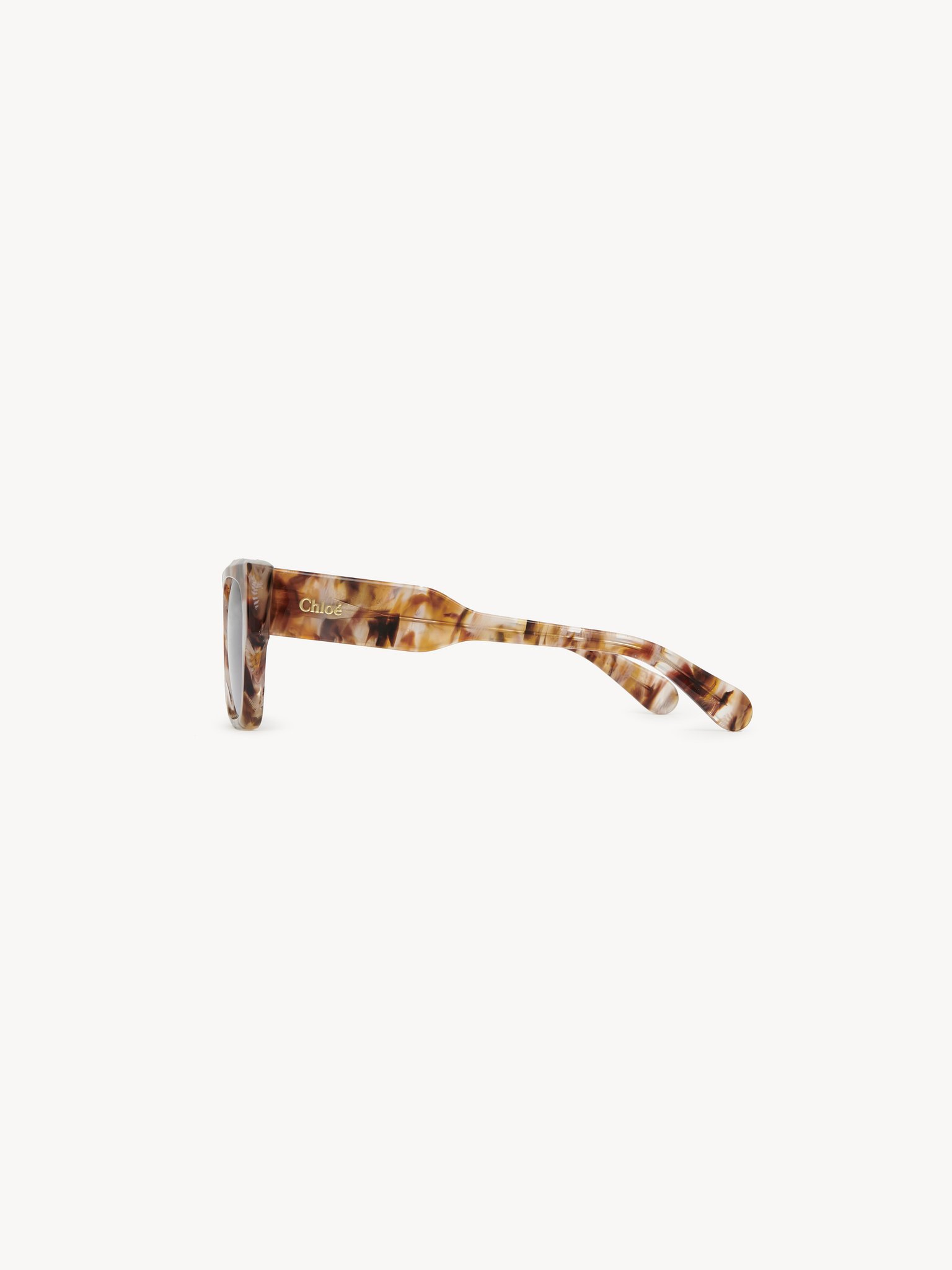 Gayia sunglasses Spotted Brown/Rose Havana recycled acetate & bio-based nylon
Gradient blue lenses Back view of the product