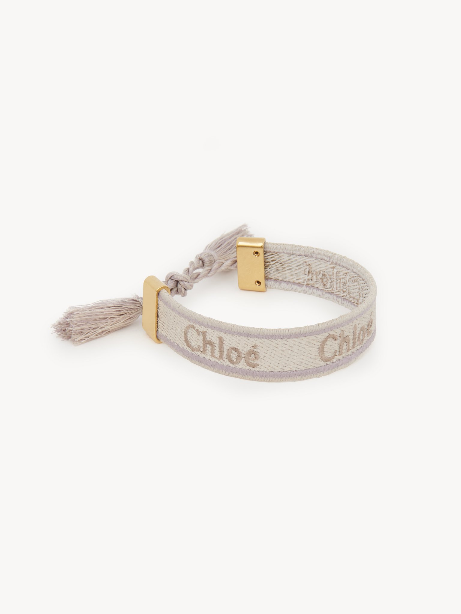 Woody bracelet Polyester & brass
Beige & Grey