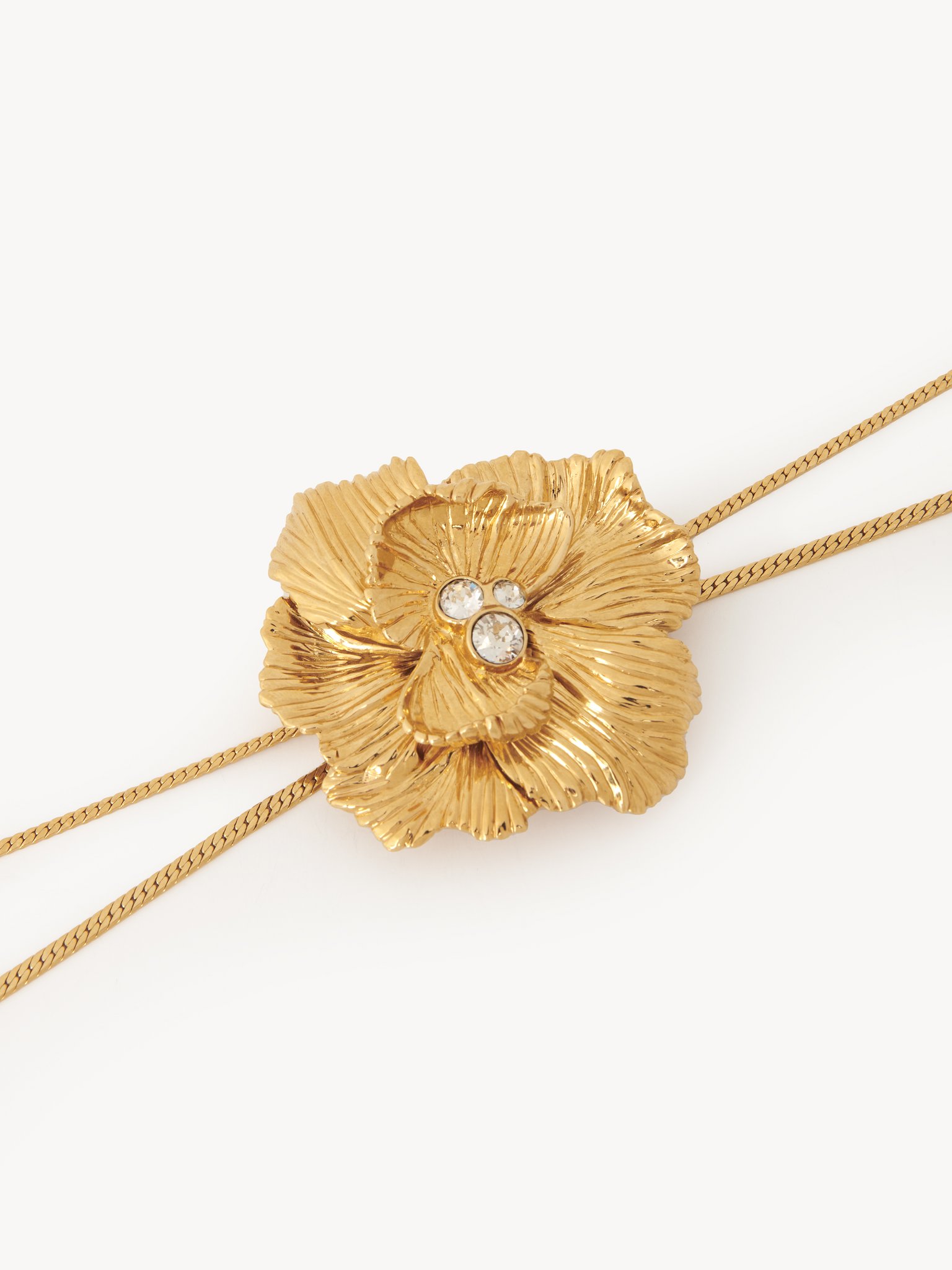 The Chloé Flowers necklace Brass & crystal glass
Vintage gold Product detail