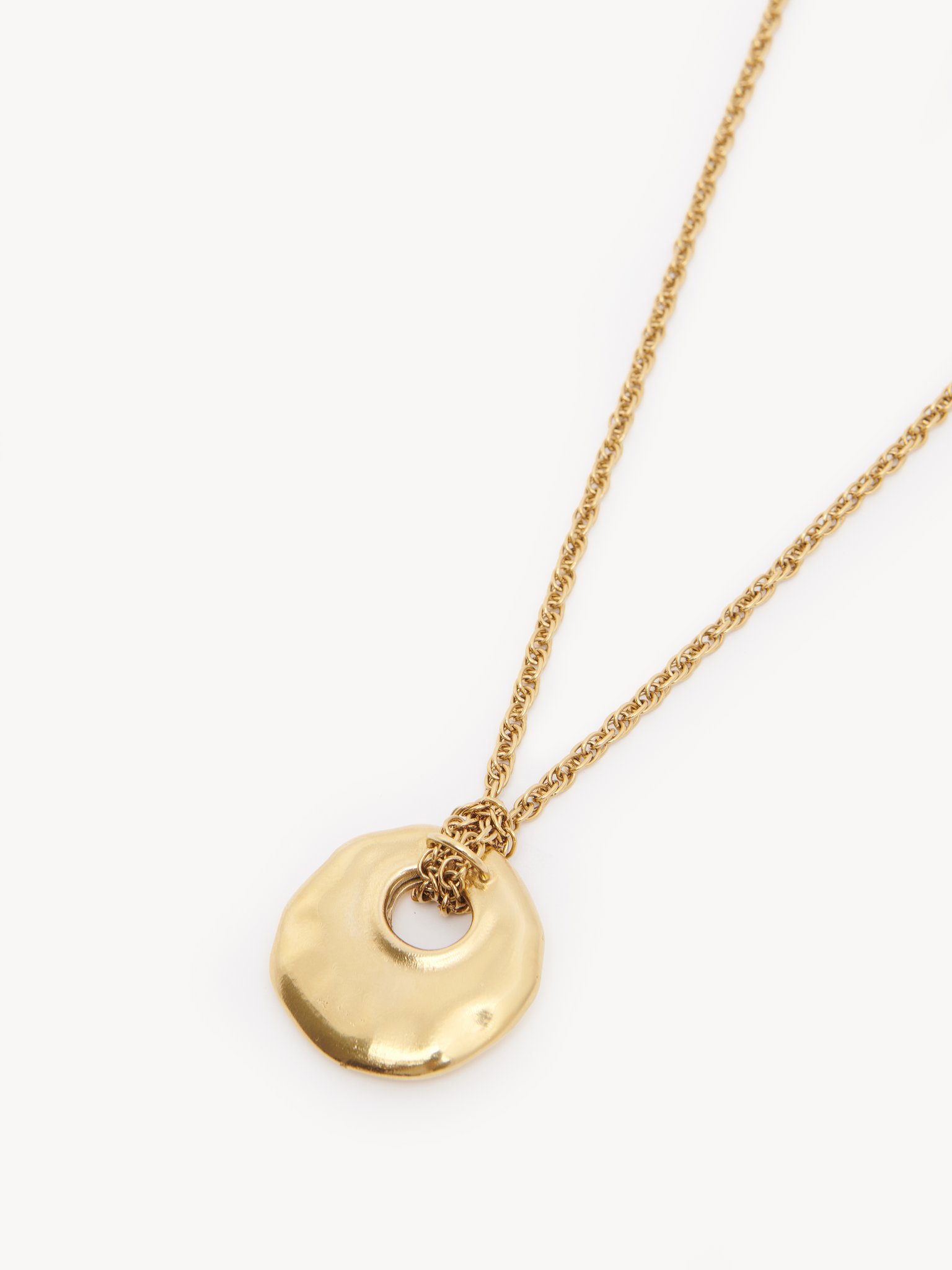 The Chloé Eclectic pendant necklace Brass
Vintage Gold Product detail