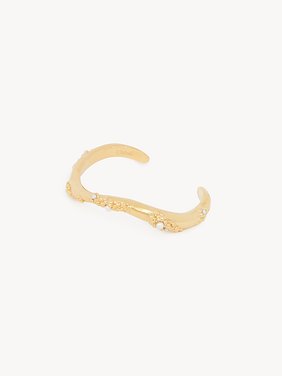 The Chloé Shells bangle Brass & synthetic pearls
Vintage Gold