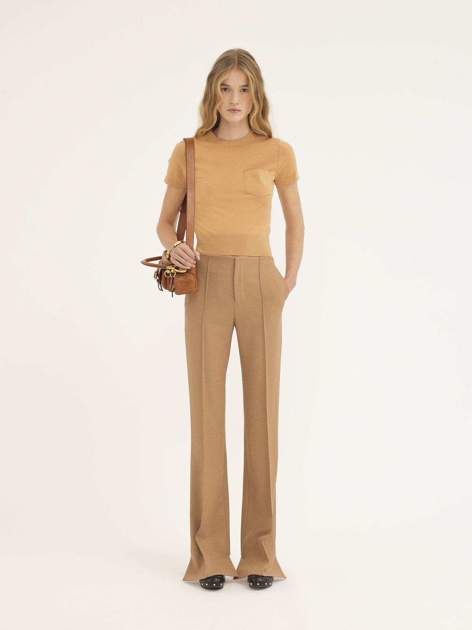 Broken-heel slim pants in wool grain de poudre Lower-impact wool grain de poudre
Coconut Brown Back view of the product