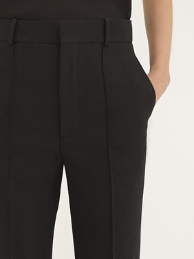 High-waisted trousers in wool gabardine Lower-impact wool gabardine
Black Front view of the product being worn