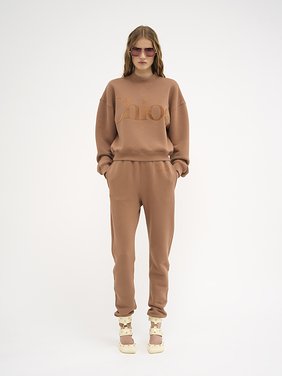 Generous jogging trousers in cotton fleece Matte velvet signature cotton fleece
Blush Nude Back view of the product