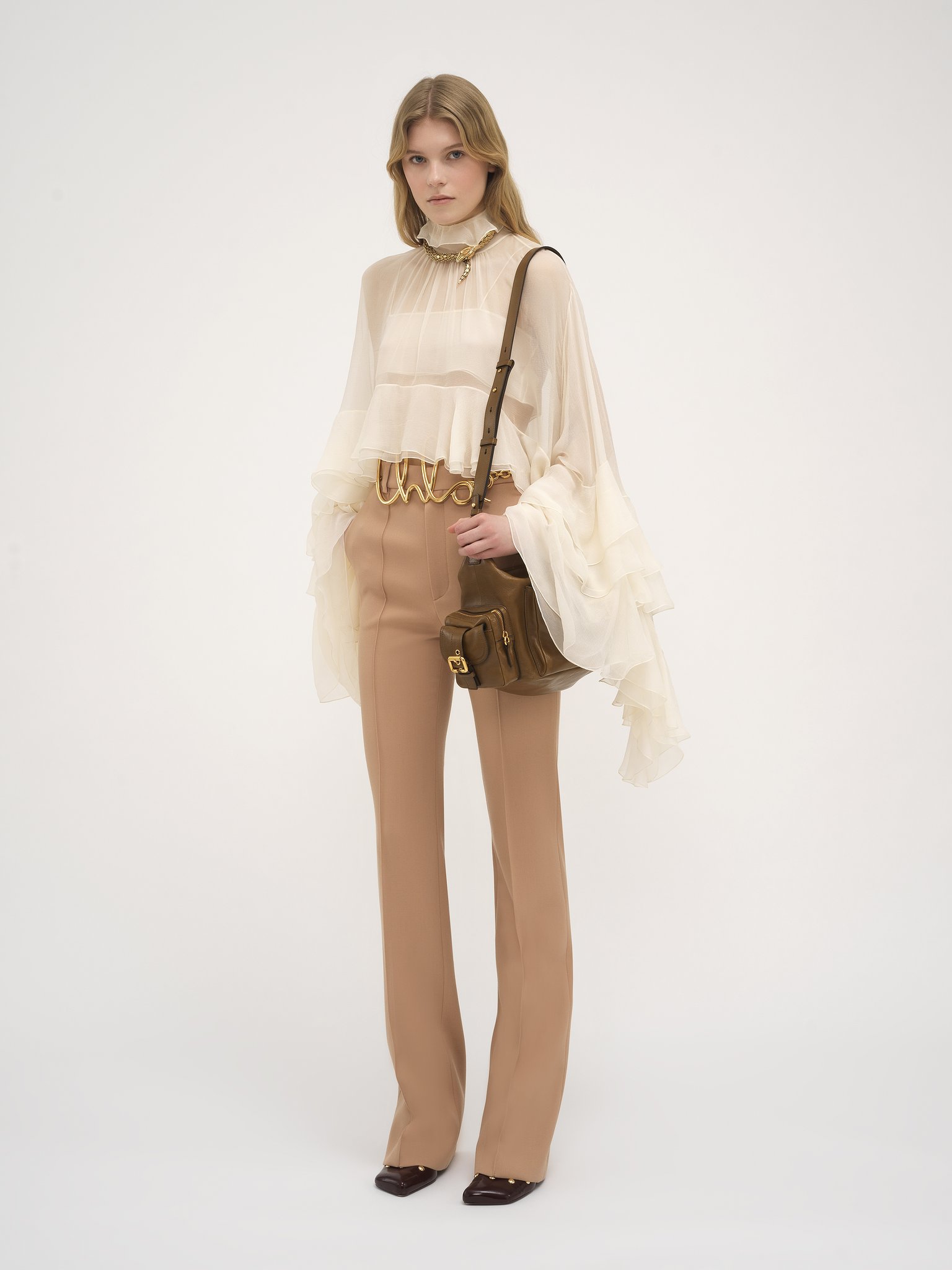 High-waisted straight pants in wool grain de poudre Wool grain de poudre
Sand Brown Back view of the product