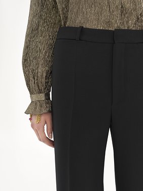 Flared tailored trousers in wool grain de poudre Lower-impact wool grain de poudre
Black Front view of the product being worn