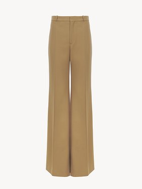 Flared tailored pants in wool grain de poudre Lower-impact wool grain de poudre
Nut