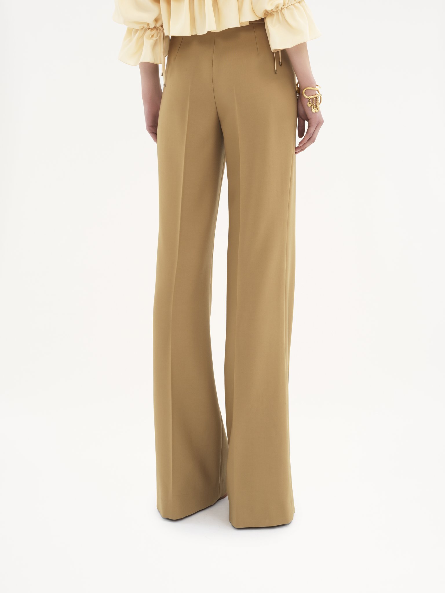 Flared tailored trousers in wool grain de poudre Lower-impact wool grain de poudre
Nut Top view of the product