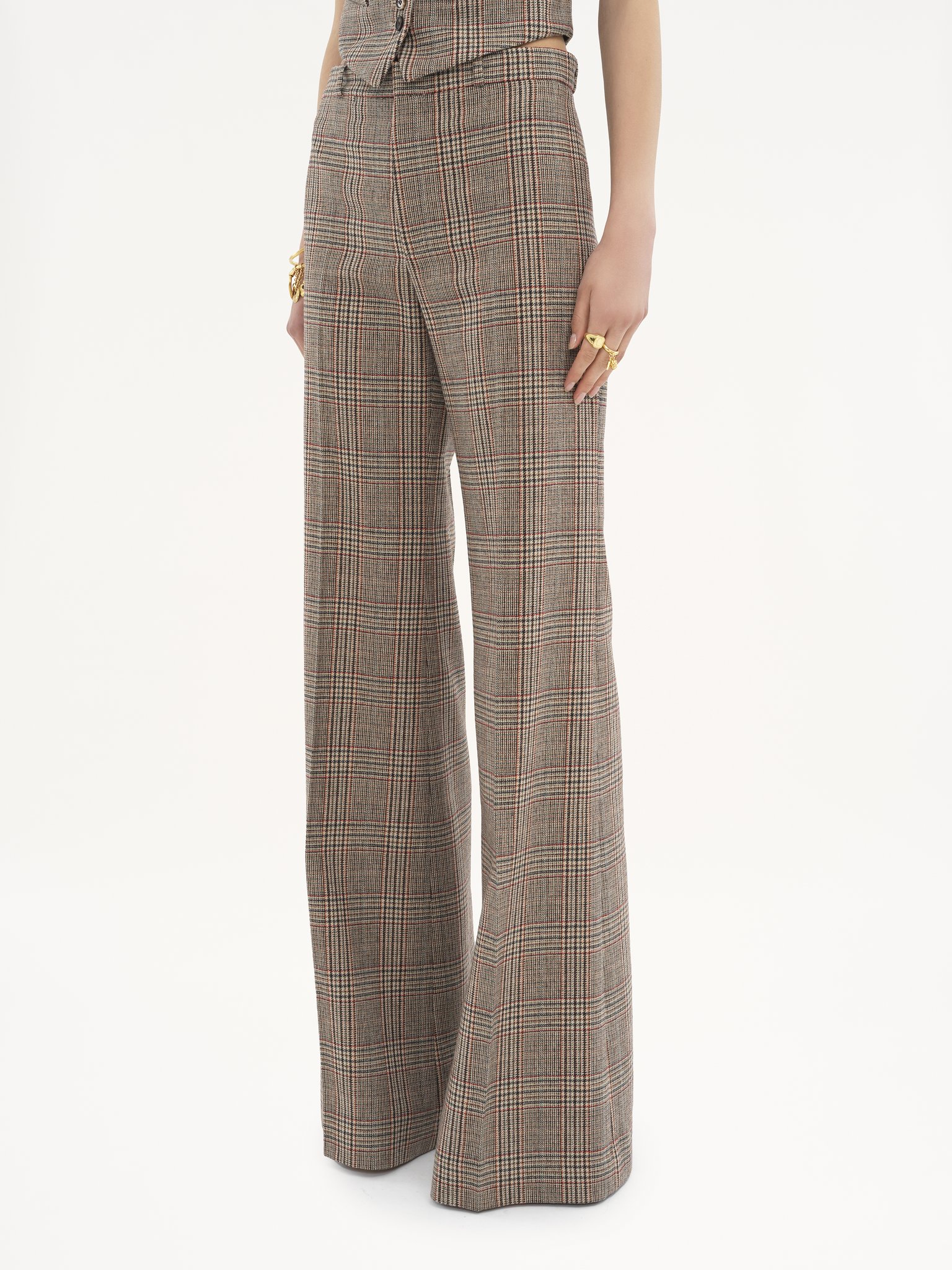 Flared tailored trousers in Prince of Wales wool Lower-impact wool Prince of Wales
Multicolour Product detail