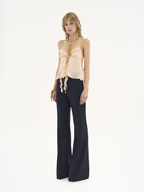 Flared tailored pants in stretch wool Lower-impact iconic stretch wool
Eclipse Blue Back view of the product