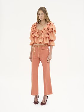 Cropped bootcut trousers in cotton velvet Garment-dyed organic cotton canvas
Shell Coral Back view of the product