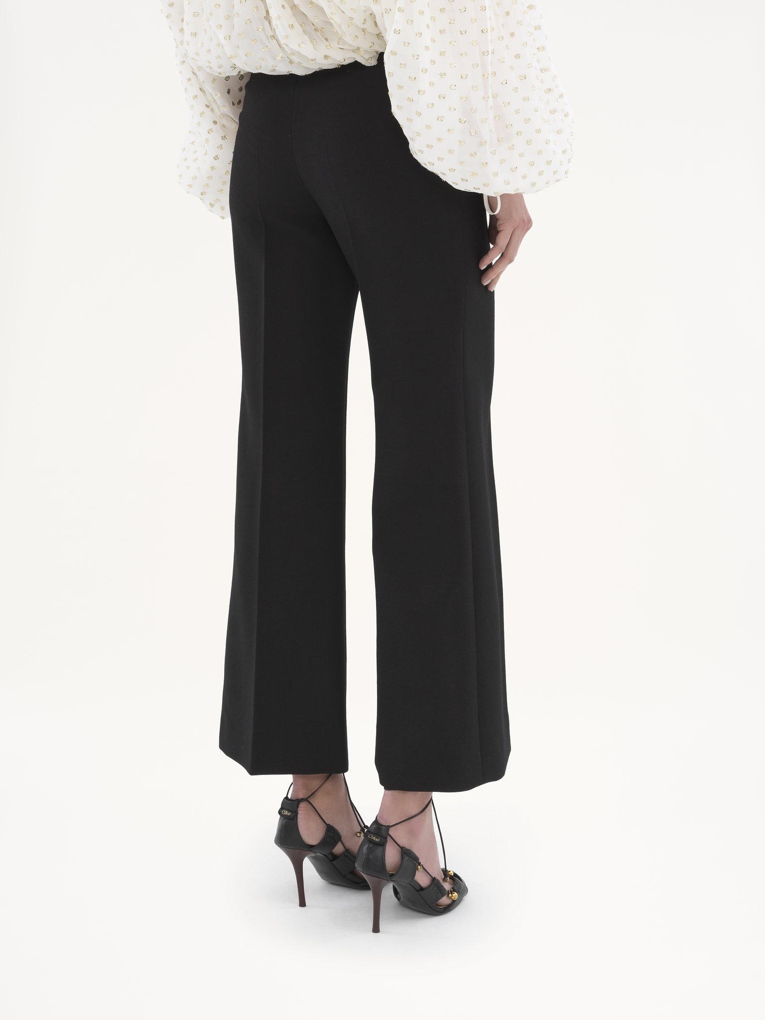 Cropped bootcut pants in wool crêpe Lower-impact wool crêpe
Black 