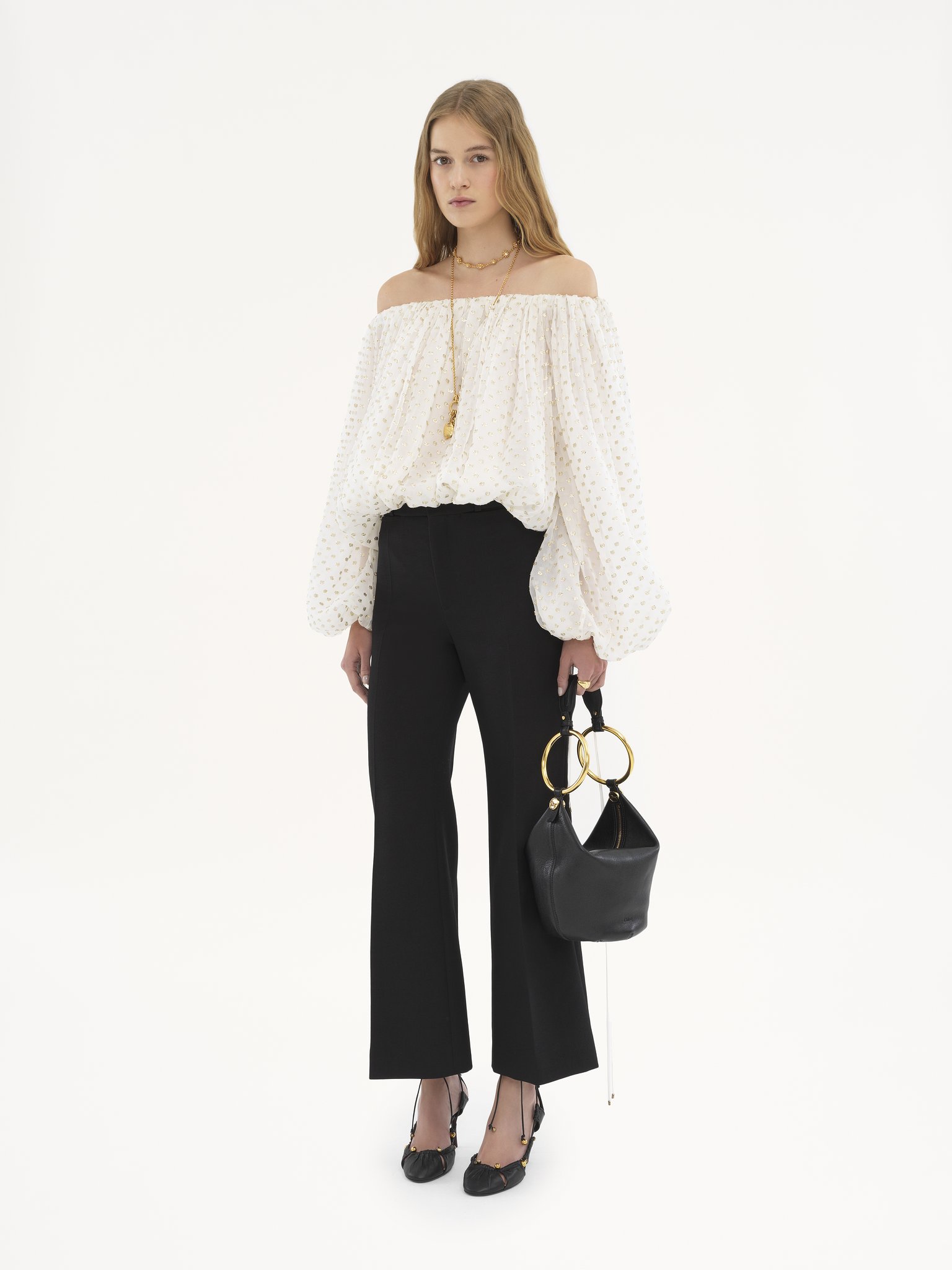 Cropped bootcut pants in wool crêpe Lower-impact wool crêpe
Black Back view of the product